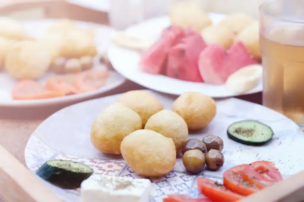 Albanian traditional food dessert petulla served for breakfast on a table