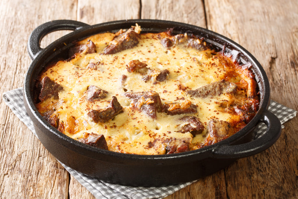 Albanian National Dish Lamb casserole with yogurt, Tave Elbasani or Tave Kosi, cooked in a pan