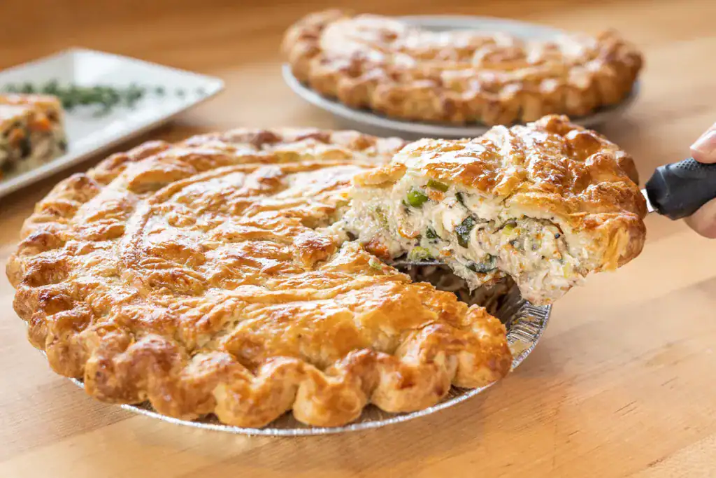 A closeup shot of a delicious pie with meat and vegetables - perfect for a food blog