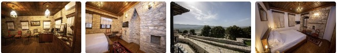 Acogedor alojamiento albanés con muebles tradicionales de madera y ambiente auténtico, ideal para unas vacaciones de aventura en Albania.